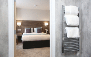 Grant Westfield waterproof bathroom wall panelling in hotel room of Marsham Hotel