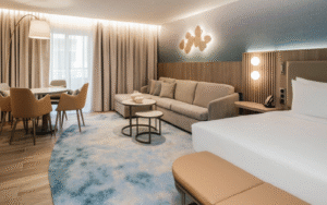 Organically shaped custom rug in Hotel Sliema guest room, designed by Studio Fabris and produced with Axminster weaving technique