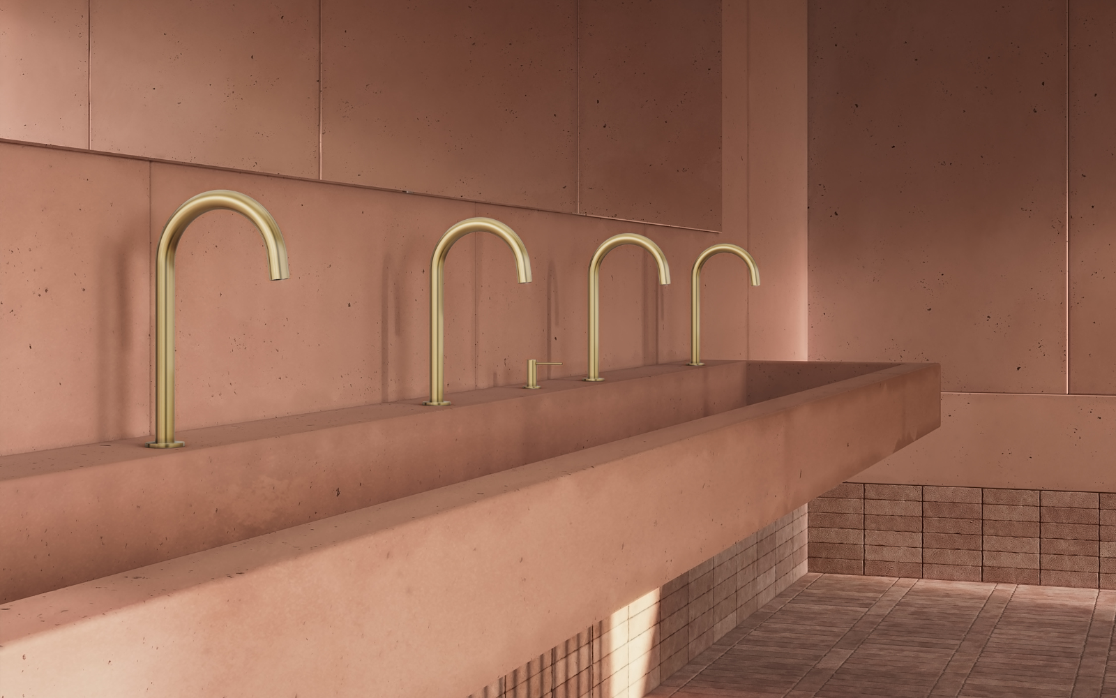 ABI Interiors brass taps in pink terracotta bathroom