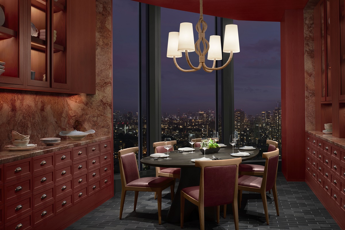 round table under light with city view