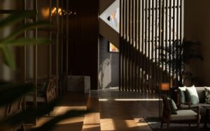 filtered sunlight and shadows through slatted wooden screen in Cacao BarPark Hyatt Kuala Lumpur with interiors by GA Group