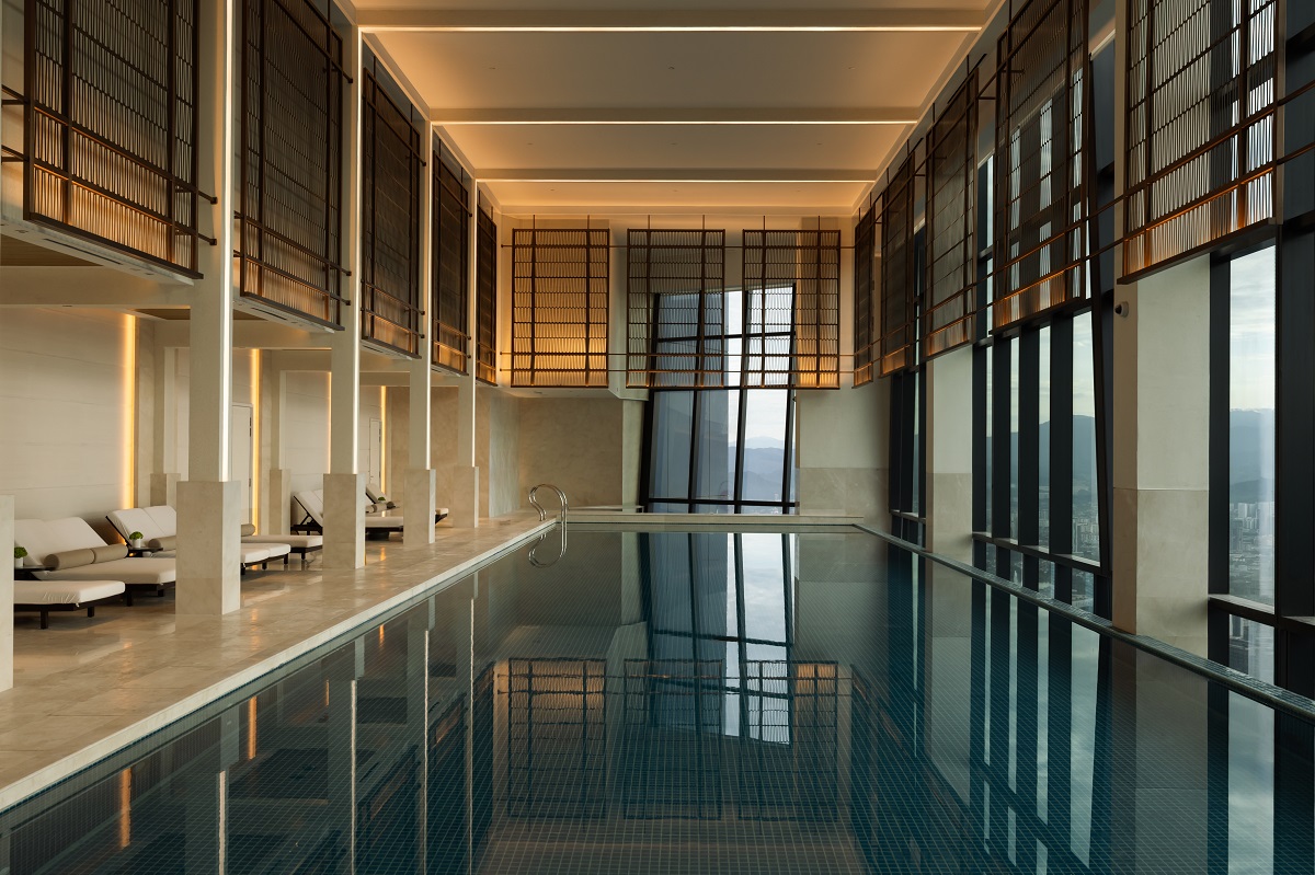 indoor swimming pool with city views in PArk Hyatt Kuala Lumpur