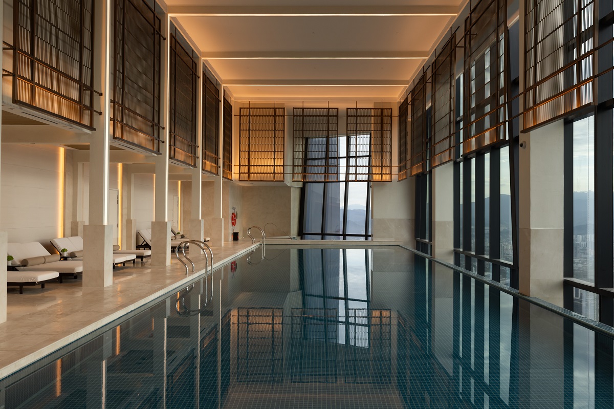 indoor swimming pool with city views in PArk Hyatt Kuala Lumpur