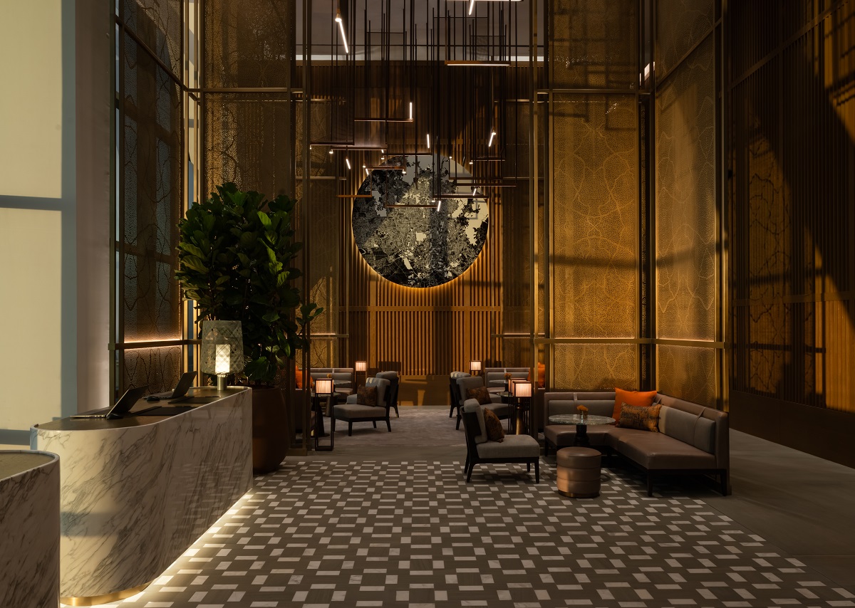marble reception desk and wood panelled walls in the Park Hyatt Kuala Lumpur