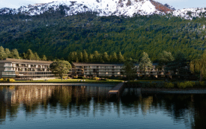 view of lake, mountain and hotel - The Meliá Collection Terrazas del Guitérrez will be located in Bariloche