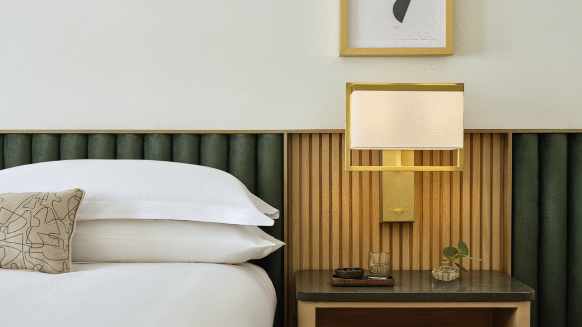 bed and headboard detail in guestroom Kimpton Ashbel New York-Park Avenue