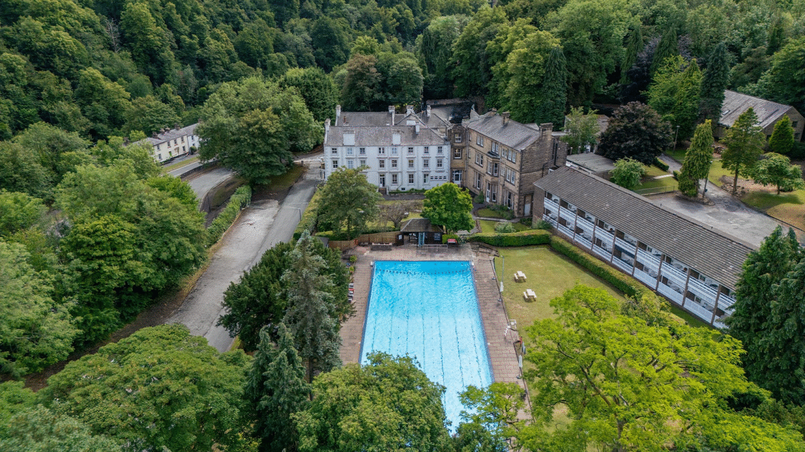 aerial view of grounds , pool and hotel - A new addition to the Radisson Individuals portfolio, the New Bath Hotel & Spa,is a historic spa retreat located on the edge of the Peak District National Park
