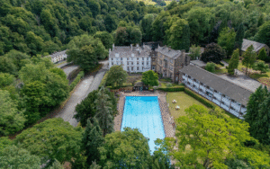 aerial view of grounds , pool and hotel - A new addition to the Radisson Individuals portfolio, the New Bath Hotel & Spa,is a historic spa retreat located on the edge of the Peak District National Park