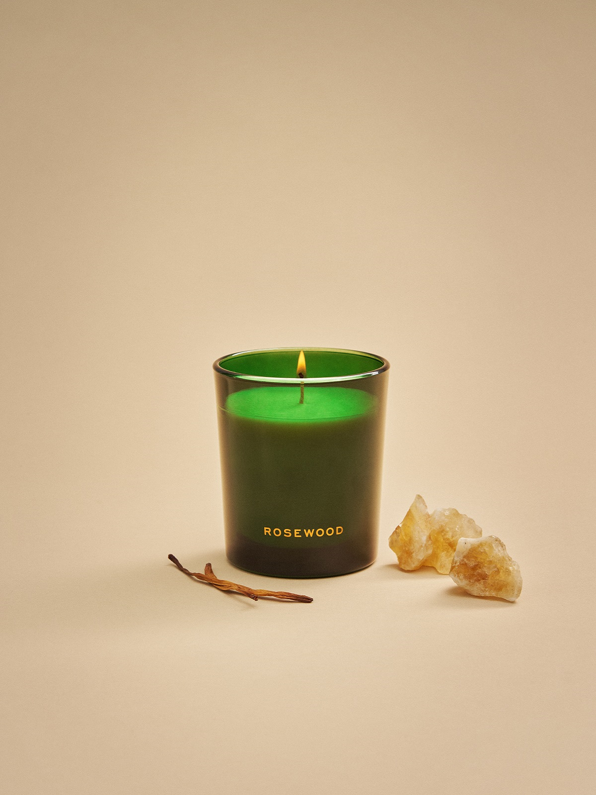 green glass Rosewood branded candle