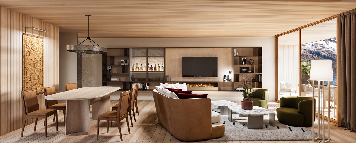 dining table in open plan living area with couch and kitchen