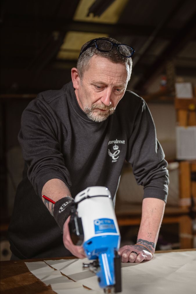 Man manufacturing fabric