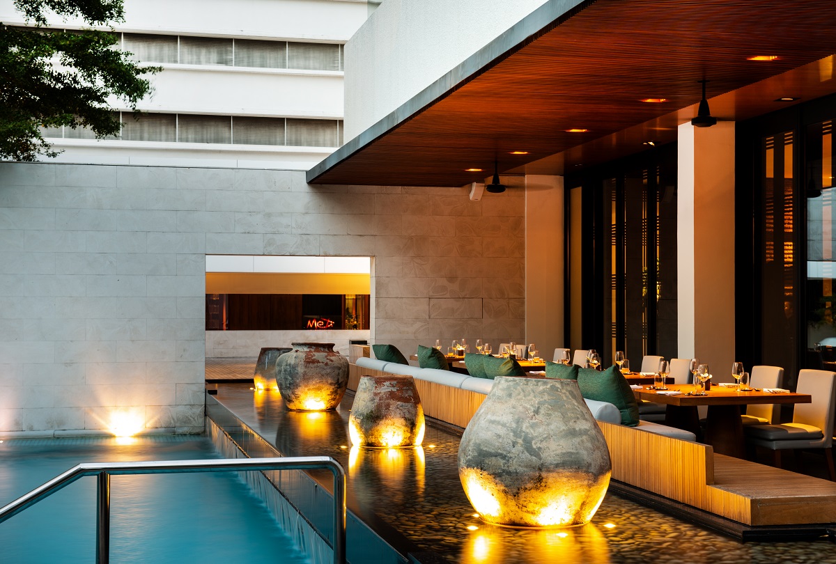 sculptural lighting around outdoor pool on terrace