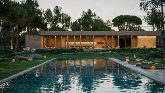 exterior view across outdoor pool of Aroeira Collections by Missoni
