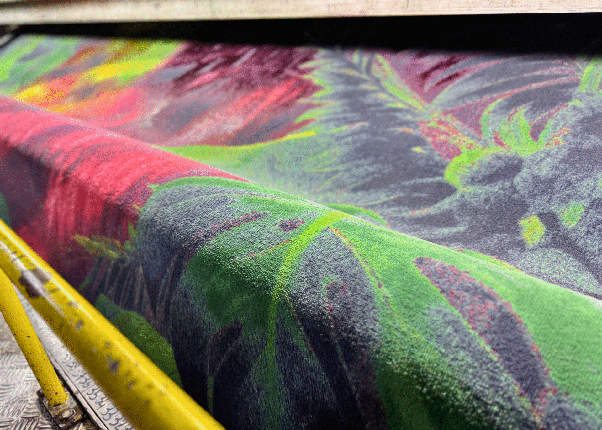 Jungle print red carpet being printed by Balsan