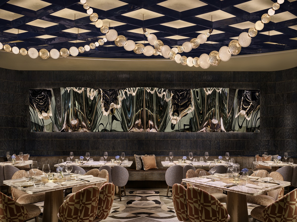 beaded ceiling lights and reflective walls in Akira Back Hong Kong