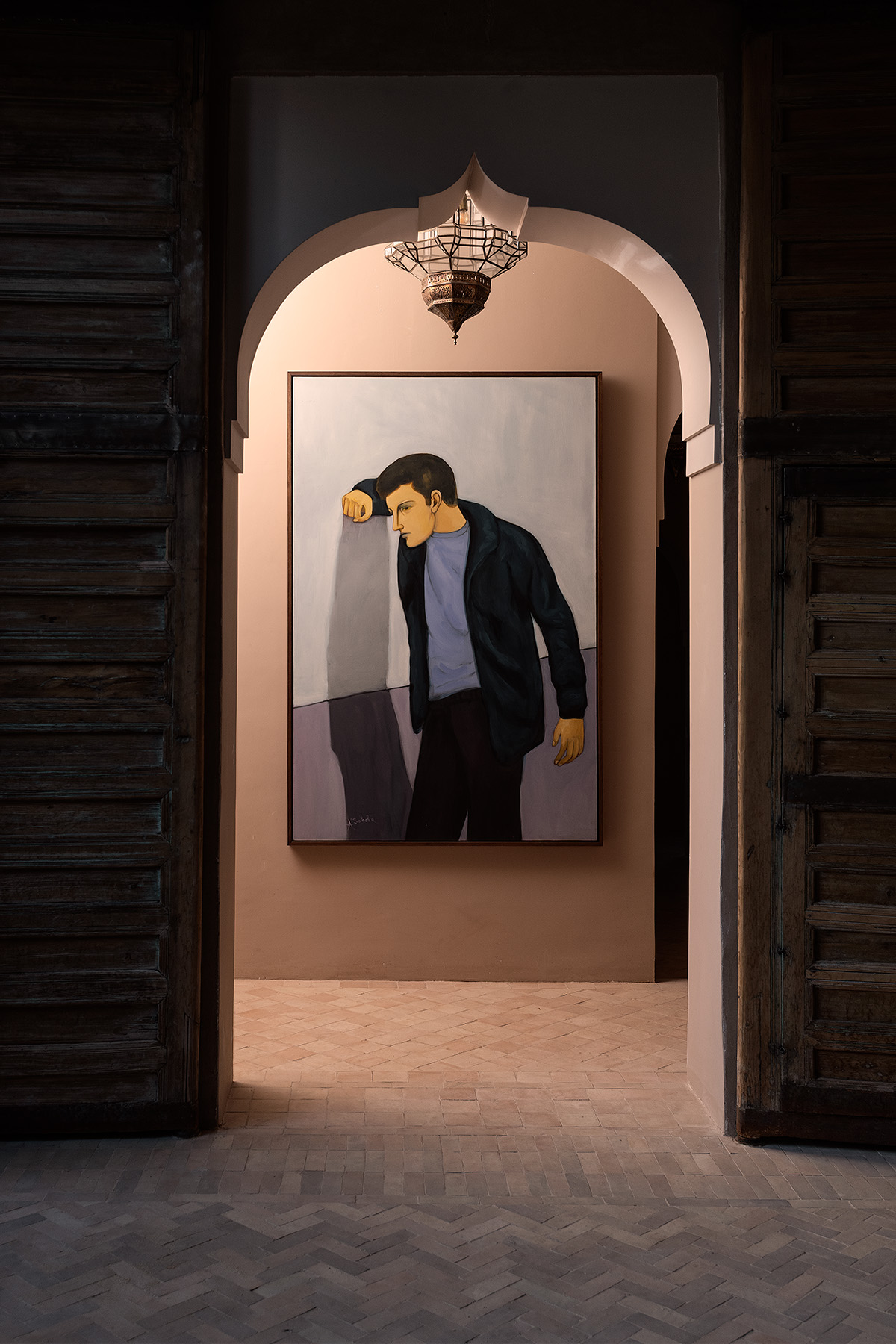 contemporary art seen through old moroccan doorway