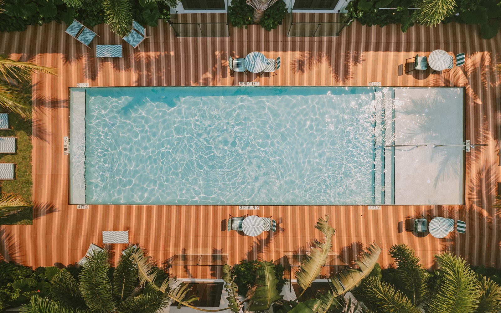 aerial view of pool and chairs at Maison Felix