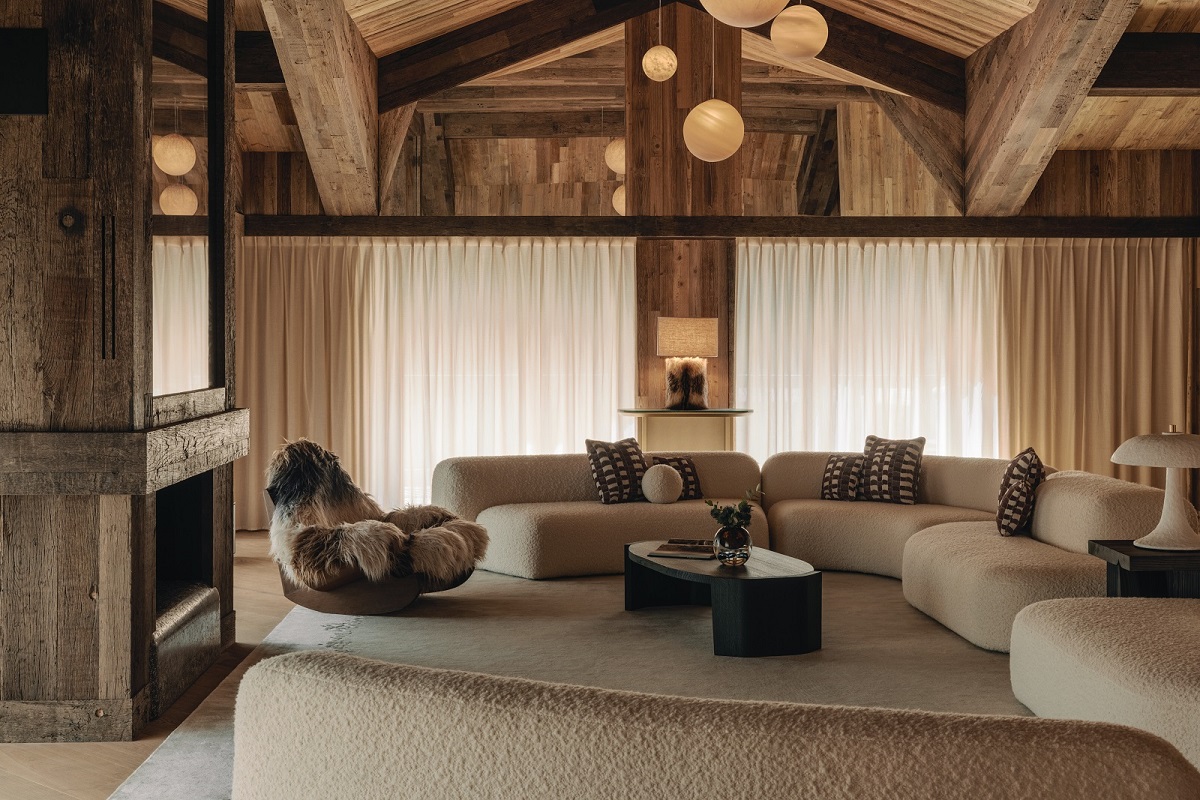 beamed wooden ceiling and cream interior in Rosewood ski lodge