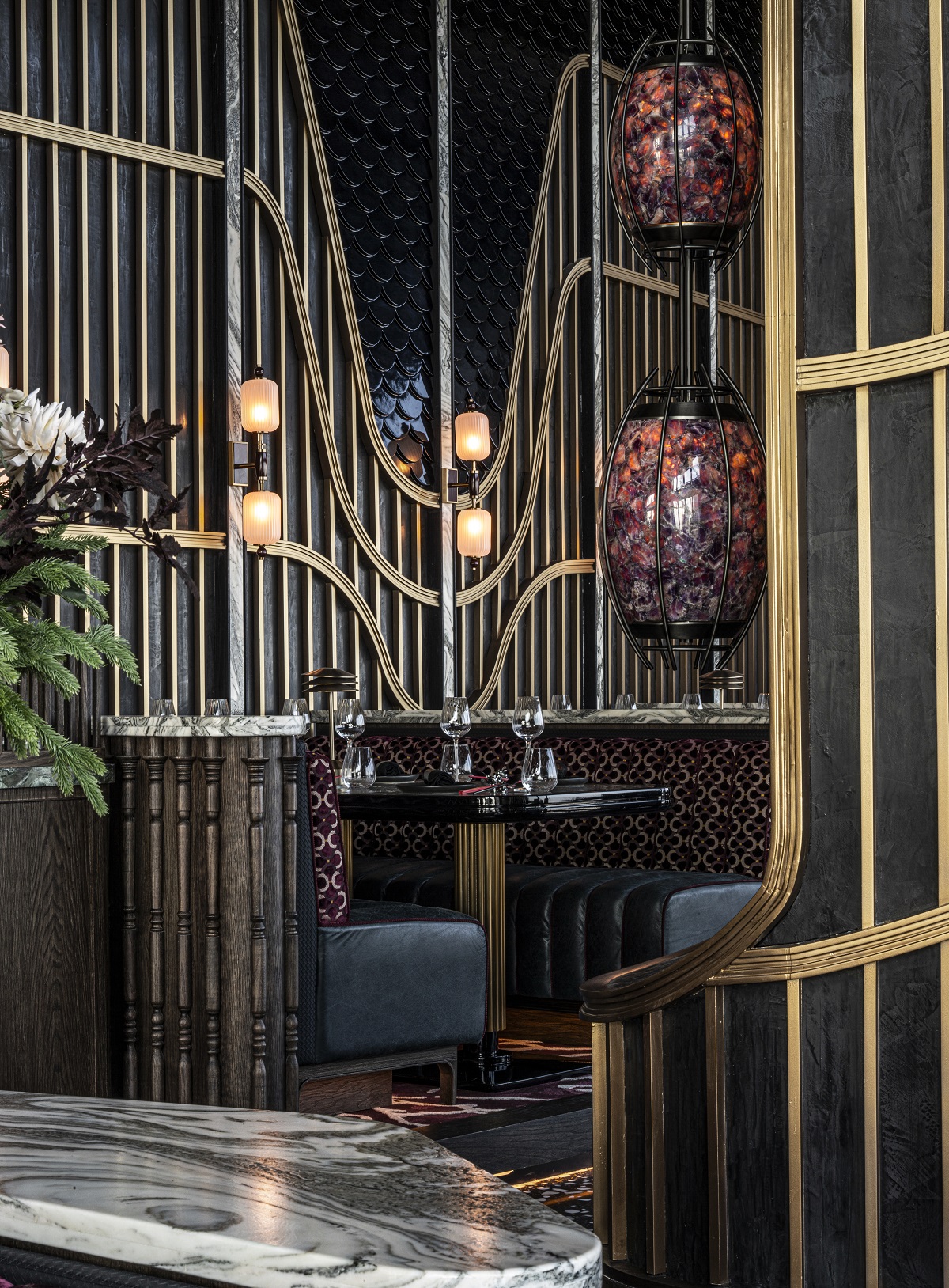 wall and surface design detail in gold and black in restaurant TATTU Dubai