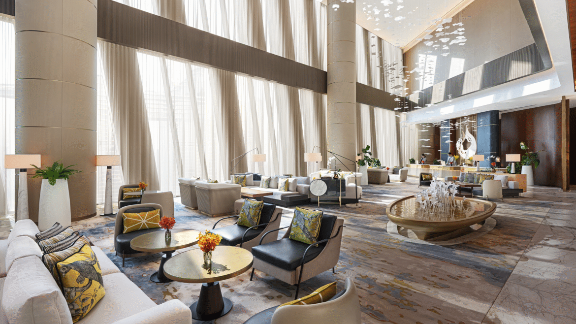 double volume lobby in Mandarin Oriental Dubai with seating and statement chandelier