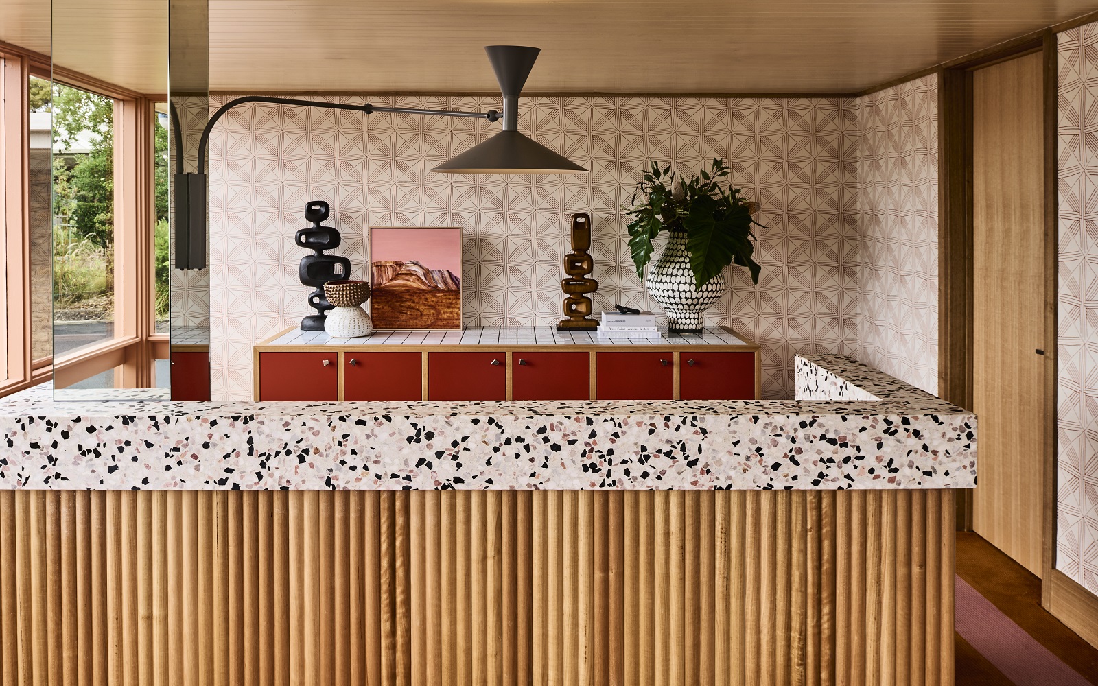 wood panel and terrazzo reception desk at Hotel Flinders with design by Studio Tate
