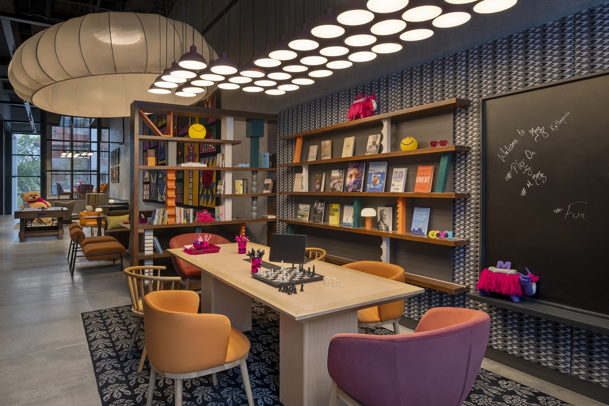 library shelves, tables and chairs in the Quiet Zone Moxy Kathmandu