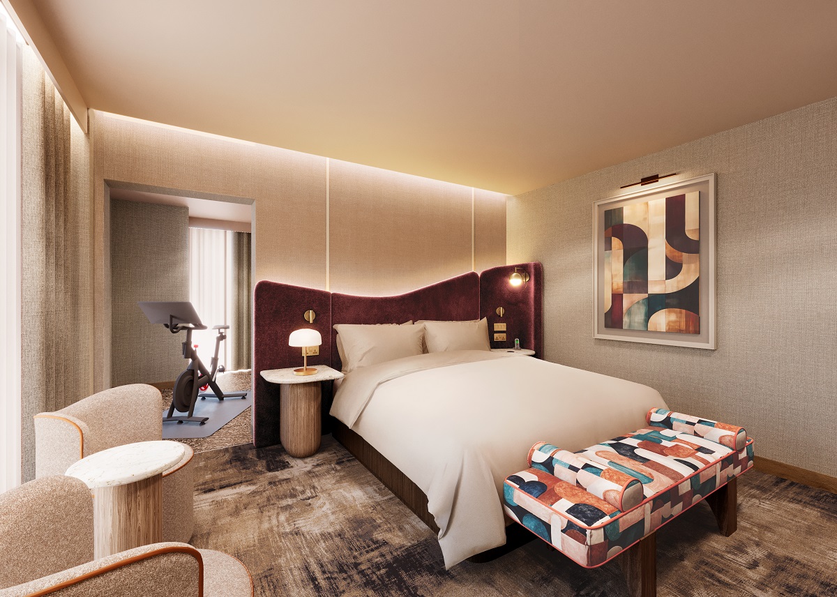 guestroom in Hilton London Bankside with pelaton and curved headboard