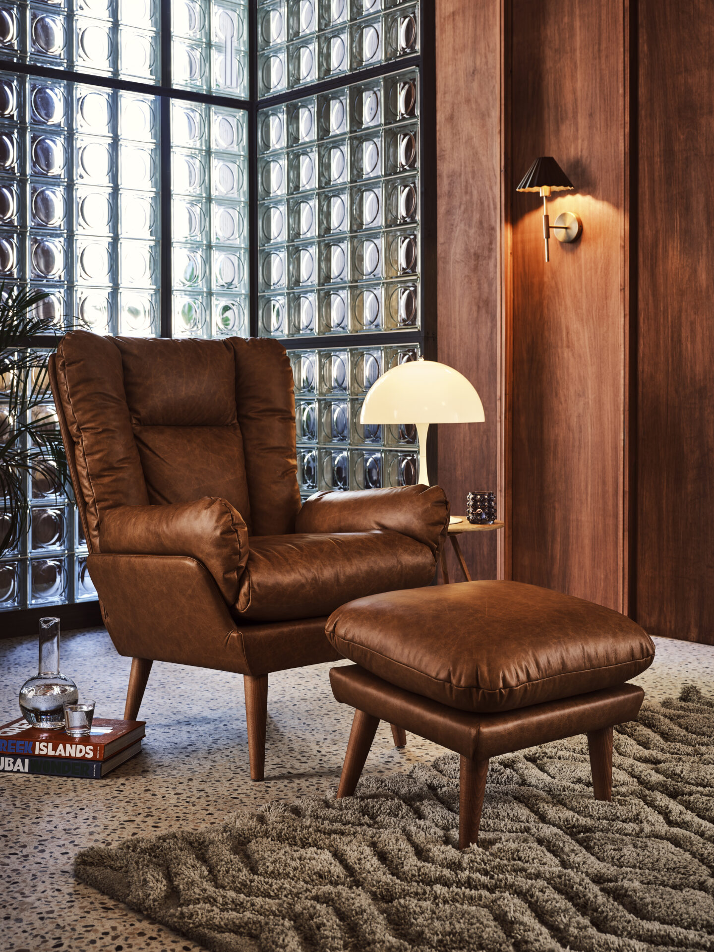 Ellora Chair Saddle Antique Leather, £1520 and Ellora Small Rectangular Footstool in Saddle Antique Leather £380