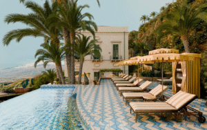 swimming pool and parasols at Villa Timeo - Belmond