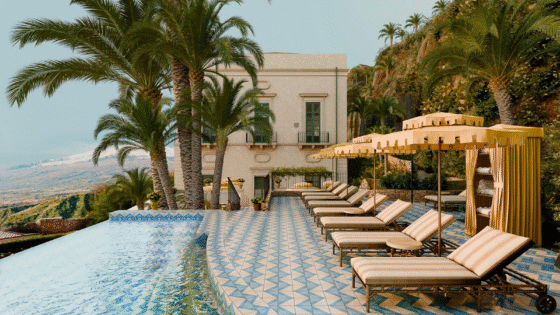 swimming pool and parasols at Villa Timeo - Belmond