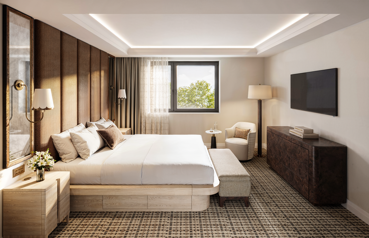 guestroom in natural colours, white and cream with window framing mountain view