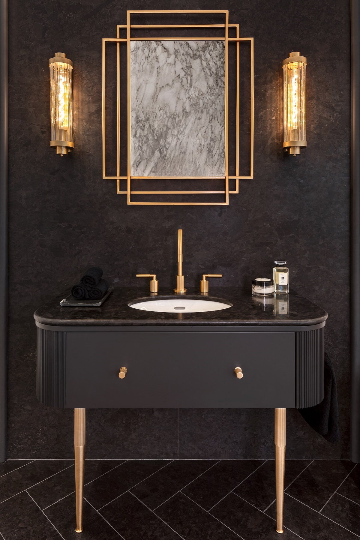 black and brass art deco inspired bathroom vanity, sink and mirror