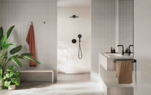 cream and white bathroom with plants showcasing Grohe Rapido Heat Recovery Shower System