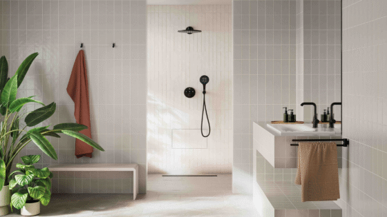 cream and white bathroom with plants showcasing Grohe Rapido Heat Recovery Shower System