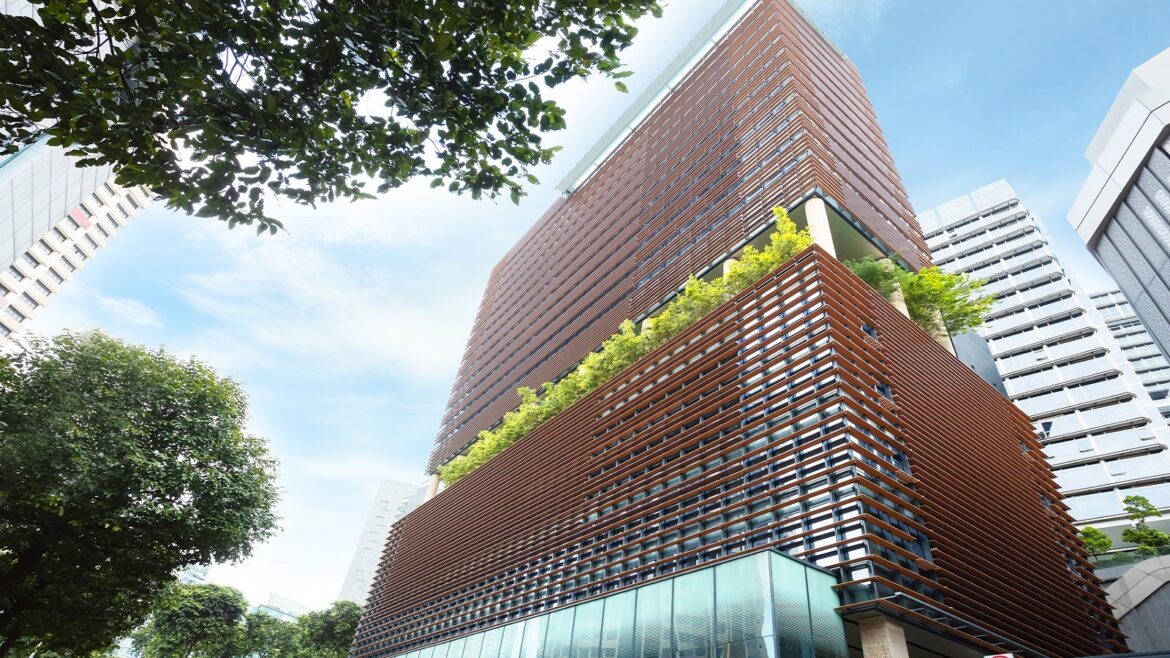 exterior view of COMO Metropolitan Singapore looking up at building from the street