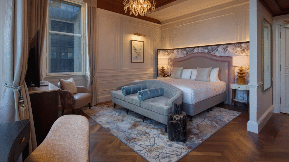 Luxury hotel bedroom at the Caledonian Edinburgh with tufted chandelier by Northern Lights