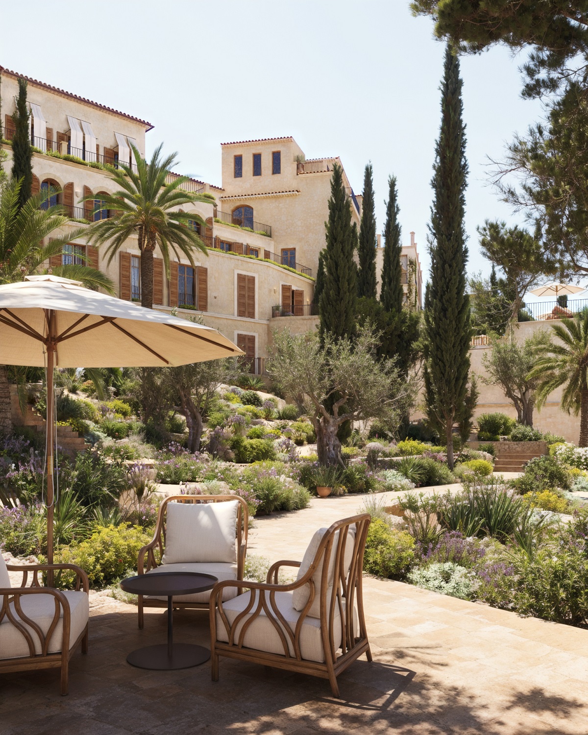 relaxed seating in Mediterranean garden under umbrella