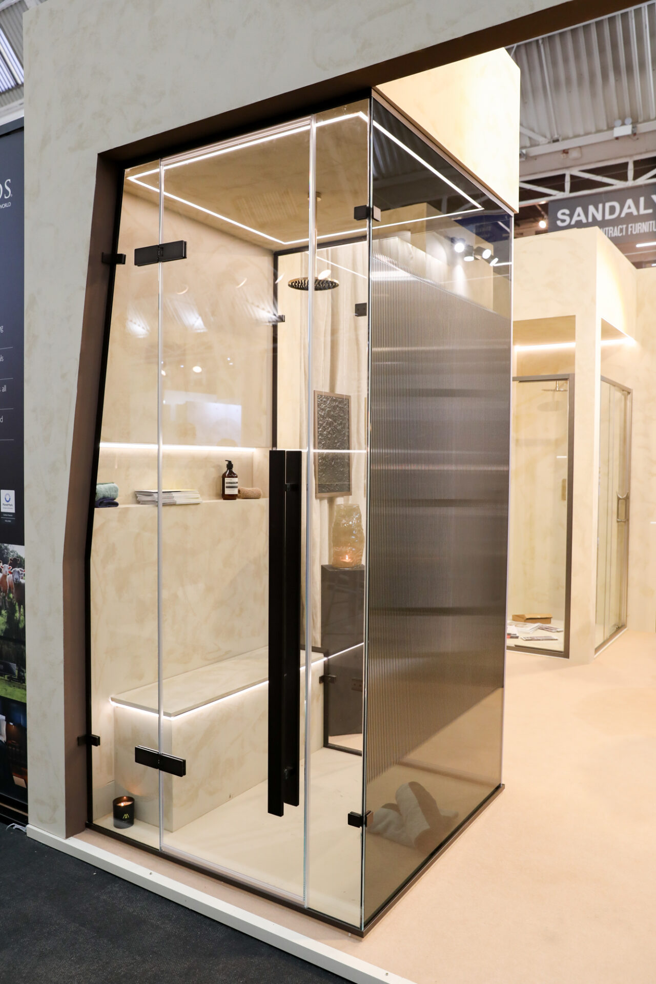 Glass panels on Majestic London stand at HIX 2025