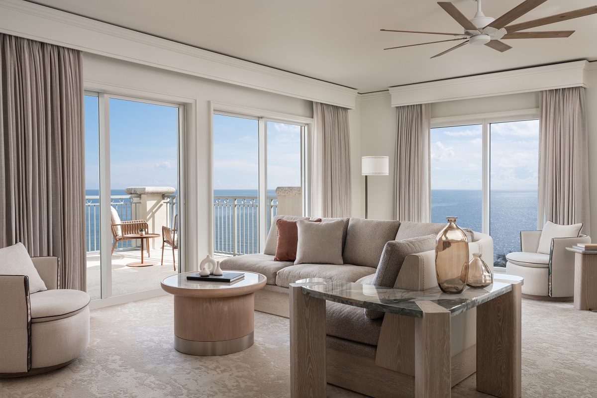 cream and beige seating and table with sea view in luxury hotel suite Ritz Carlton Key Biscayne