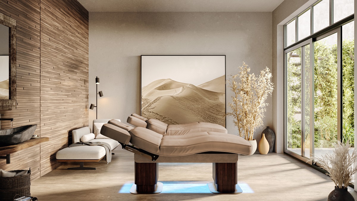 spa design with warm neutrals, stone wall and floor to ceiling glass in front of treatment beds from Lemi