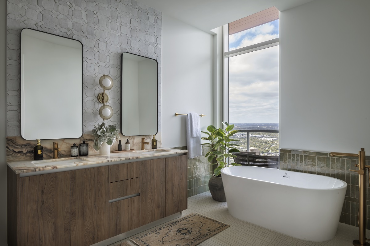 freestanding bath and double vanity with views over Austen