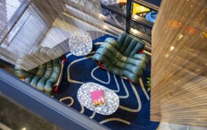 aerial view of reception and lobby with pattern carpet in TRIBE Den Haag