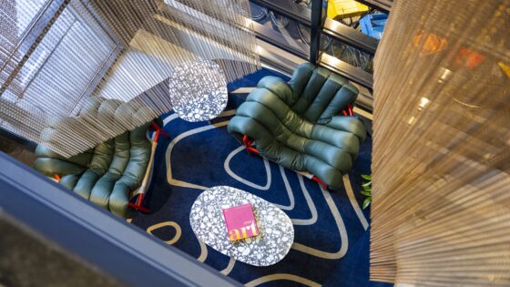aerial view of reception and lobby with pattern carpet in TRIBE Den Haag