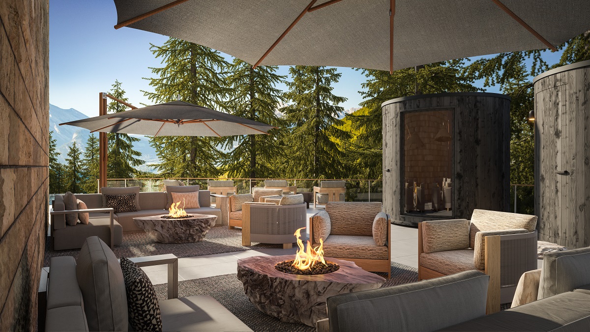 spa terrace with chairs around firepit and mountain views