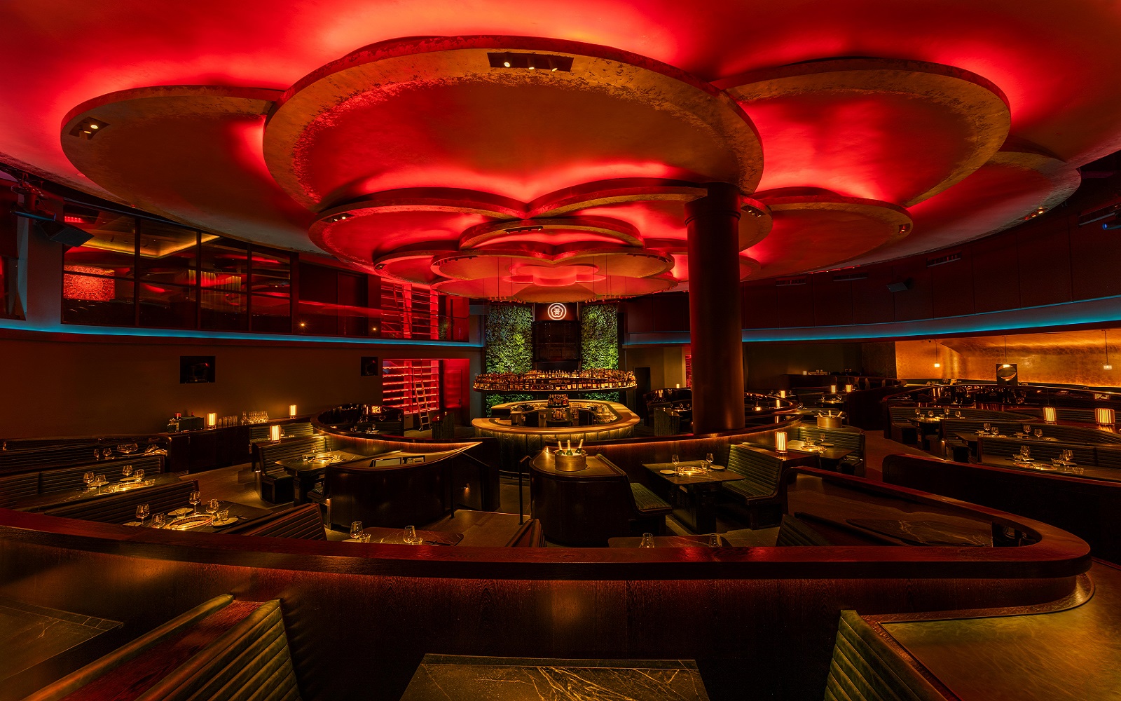 Rockwell Group design for _COTE Vegas_with red logo and ceiling lighting