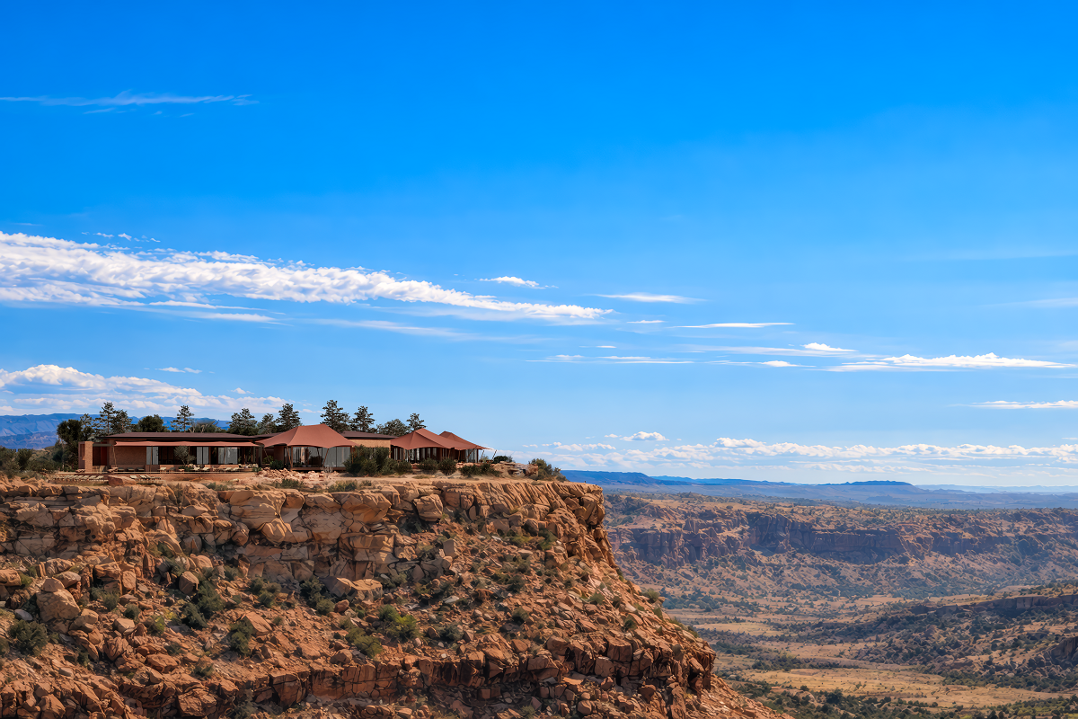 hotel sitting on the edge of a cliff looking out over the canyon - six-senses-desert-sanctuary-to-emerge in-southern-utah-