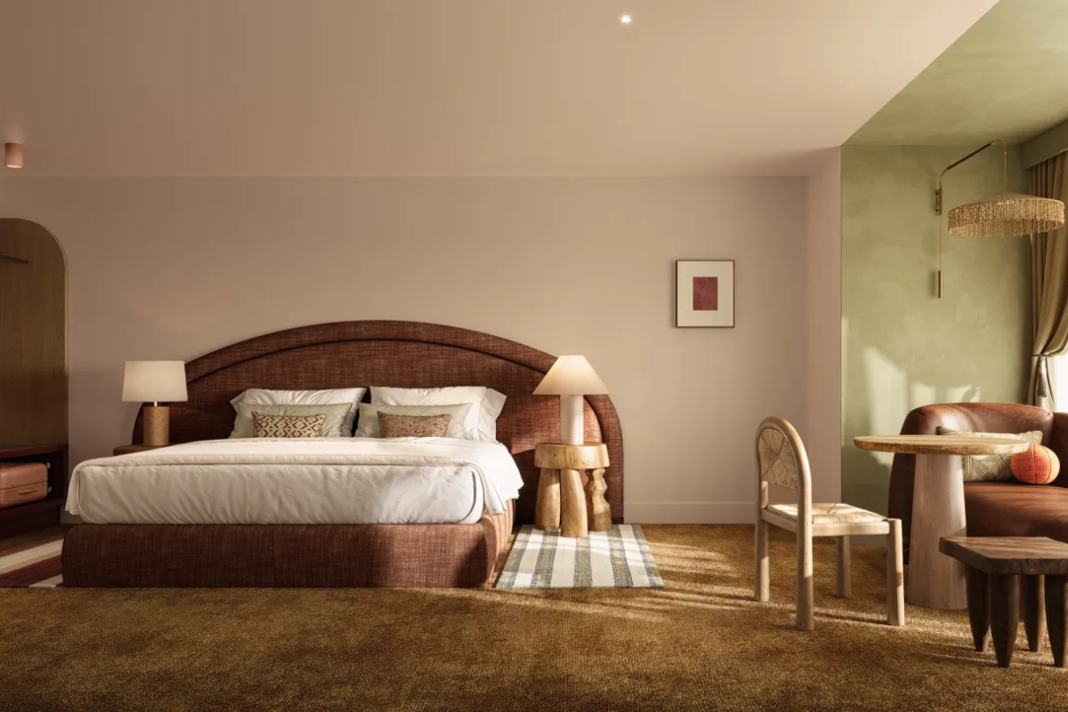Bedroom in muted earth tones with natural wood accent furniture, at Hyde Hotel Perth
