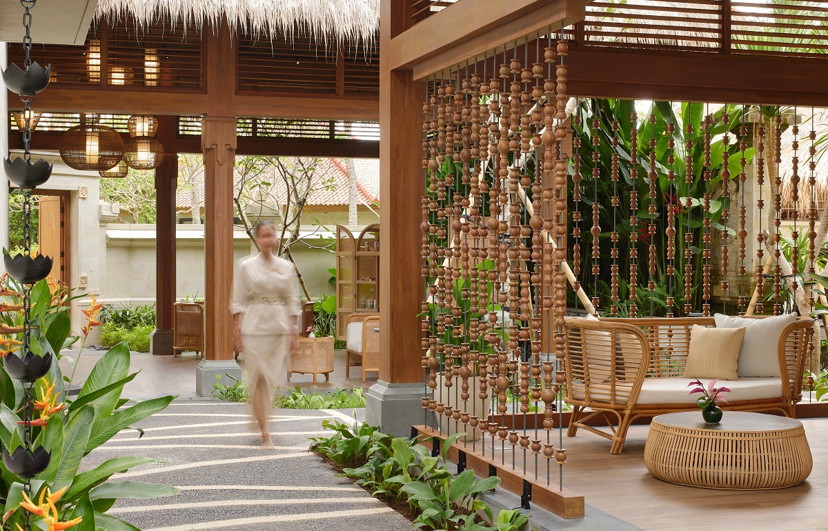 wood and thatch leading to the spa area in Paradisus Bali