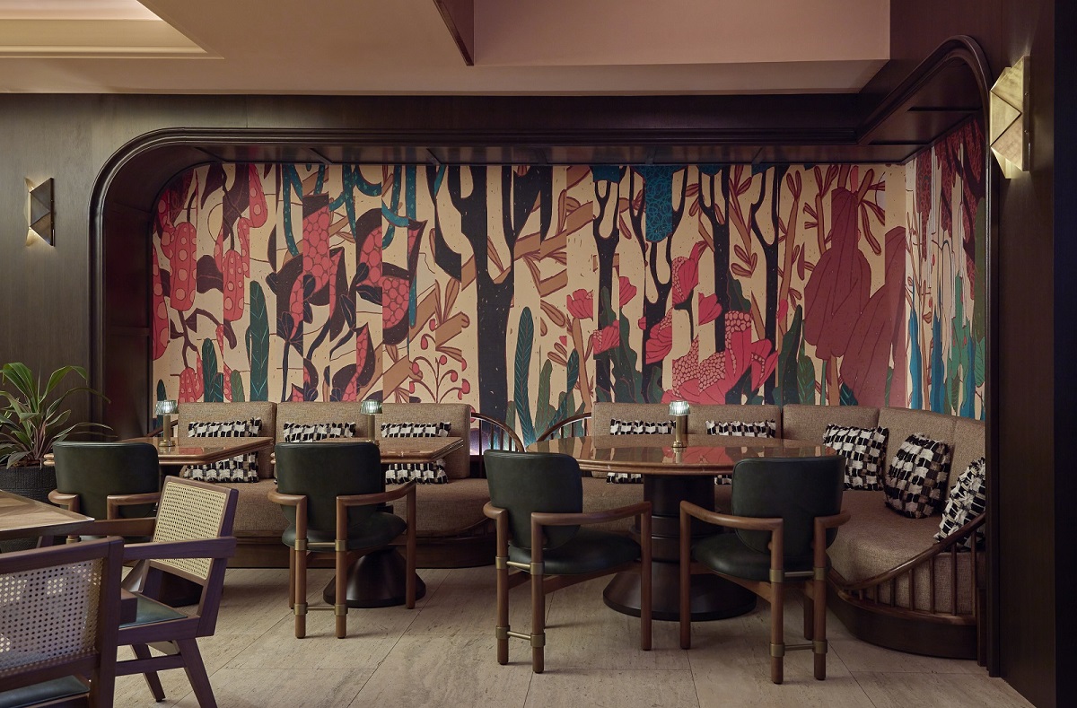 mural behind dining tables in Cameo-Beverly-Hills-LXR-Hotels-Resorts-Zampo restaurant