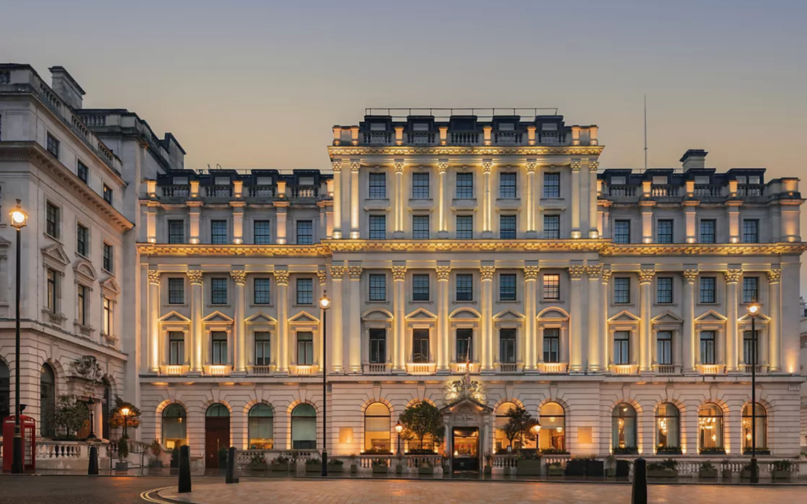 Sofitel London St James exterior at dusk, with warm yellow lights
